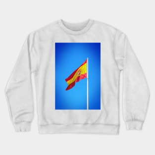 Spanish flag waving against clear blue sky Crewneck Sweatshirt